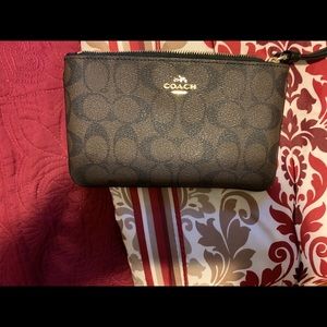 Coach Large Wristlet In Signature Canvas